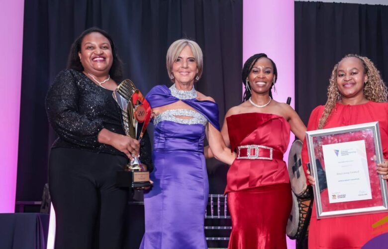 Award winners on stage with their trophies